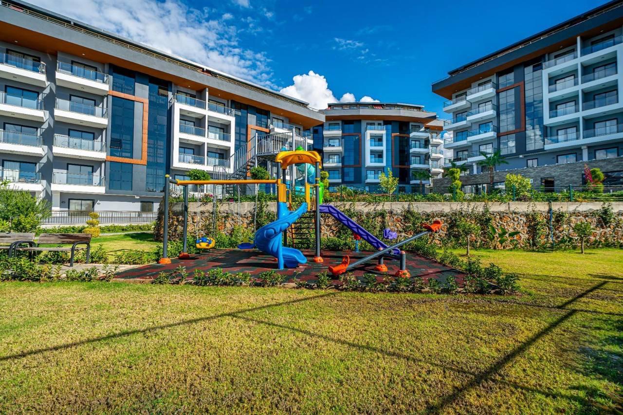 Apartament 1+1 z widokiem na morze w dzielnicy Kestel, Alanya